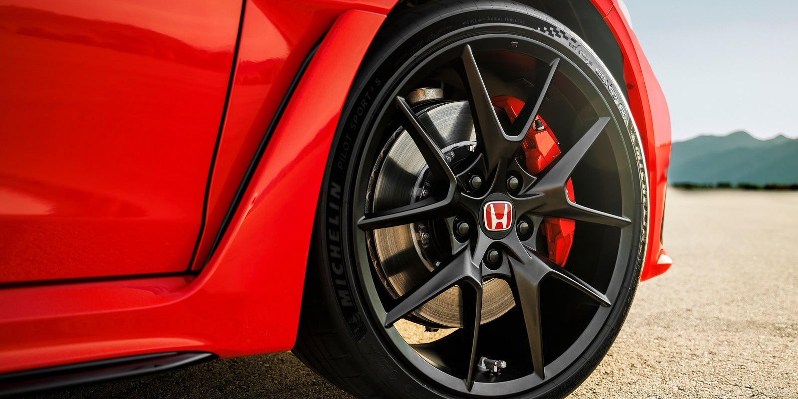 Cinematic shot of the Tires and Brake Pads of the 2026 Honda Civic Type R