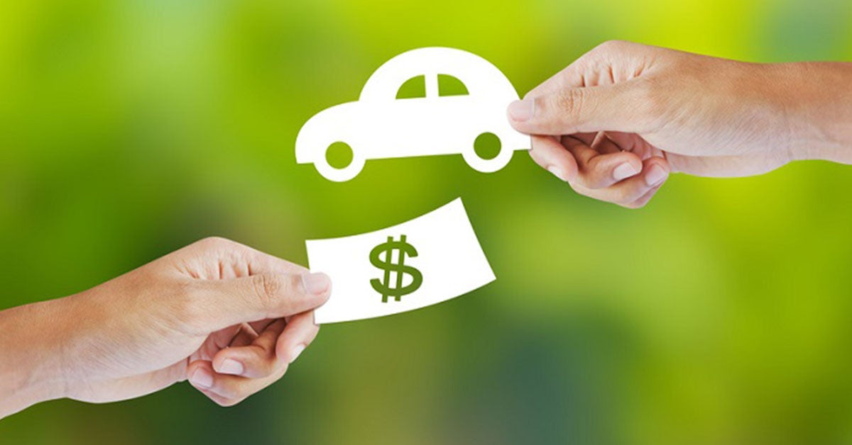 Cash and keys exchanging hands as part of Honda trade-in